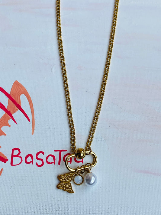 The Butterfly With The White Pearl Necklace
